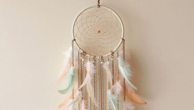 Bohemian dreamcatcher with pastel feathers and beads