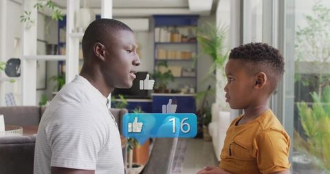 Father and Son Quality Time with Social Media Engagement Concept