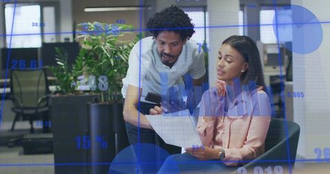 Financial Data Overlay on Diverse Business Colleagues Collaborating in Office - Download Free Stock Images Pikwizard.com