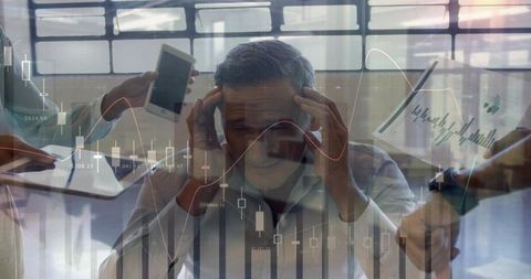 Stressed executive clutching head in intense boardroom finance meeting with data overlays