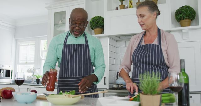 Mature Couple Cooking Together in Modern Kitchen - Download Free Stock Images Pikwizard.com