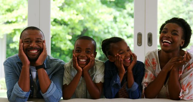 Happy Family Relaxing and Smiling Together at Home - Download Free Stock Images Pikwizard.com