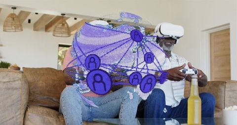 Senior man wearing vr headset playing game with holographic globe network overlay