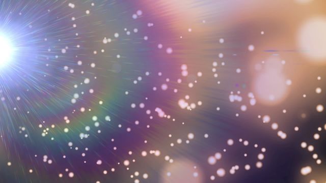 This animation showcases abstract light sparkles with a colorful rainbow effect on a dark background, providing a mesmerizing and dreamy atmosphere. Ideal for use in digital art projects, video backgrounds, holiday-themed presentations, or as visual effects in music videos or creative film projects.