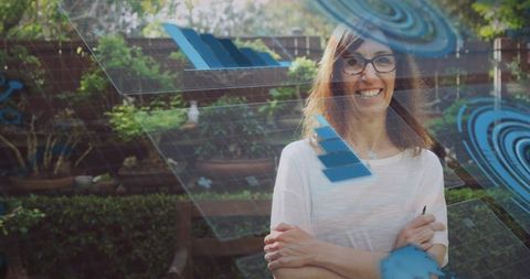 Mature woman using augmented reality in backyard with blue data visualization overlays
