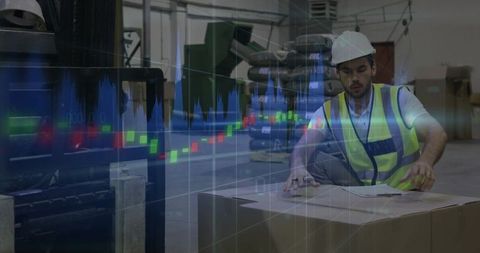 Industrial worker analyzing logistics data for productivity