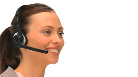 Smiling Businesswoman with Headset Against White Background