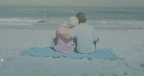 Mother and Son Embracing on Serene Beach Shoreline