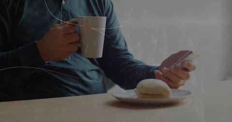 Person Relaxing with Coffee and Phone Setting Calming Atmosphere