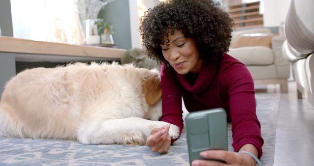 Smiling Woman with Curly Hair Video Chatting with Pet Dog at Home - Download Free Stock Images Pikwizard.com