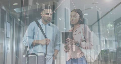 Diverse professionals analyzing financial data at modern workplace