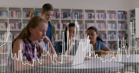 Students collaborating on laptop in library with dynamic waveform data overlay for edtech
