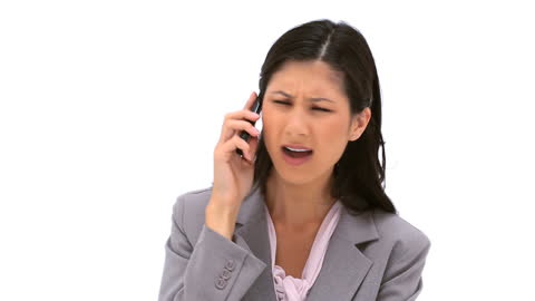 Woman on Call Showing Concern in Office Attire