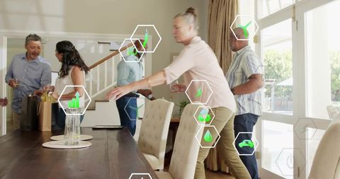 Multigenerational family gathering around dining table with eco technology overlays