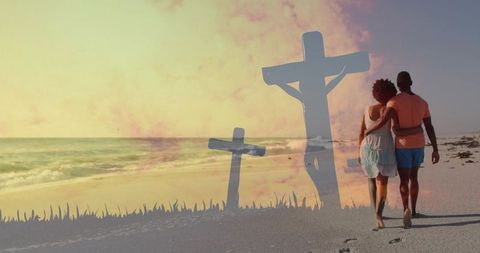 Sunset beach walk: romantic couple walking arm-in-arm with cross silhouette overlay