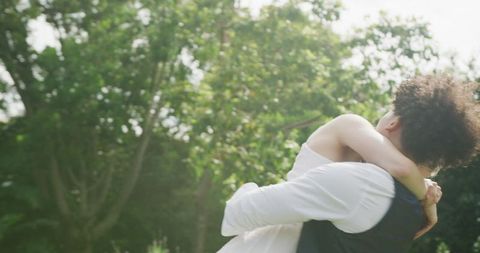 Happy Couple Celebrating Outdoors at Wedding