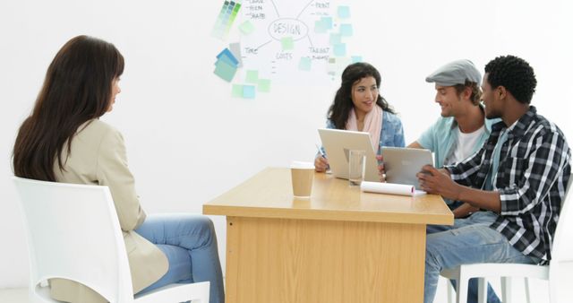 Diverse Team Collaborating in Casual Office Setting - Download Free Stock Images Pikwizard.com