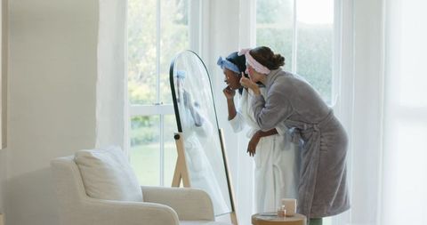 Women Bonding in Luxurious Skincare Routine at Home