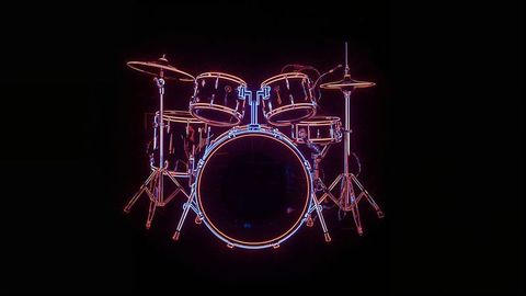Neon glowing drums in vibrant studio space
