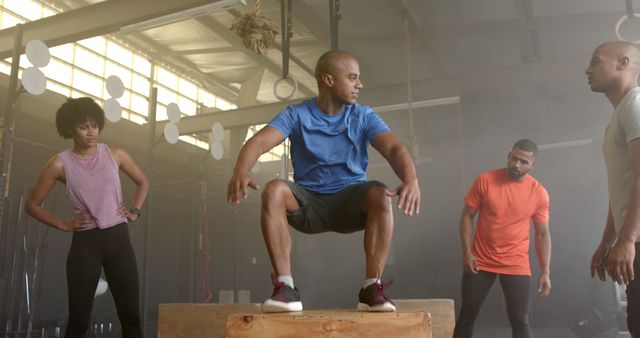 Diverse Group Training Together in Crossfit Gym - Download Free Stock Images Pikwizard.com