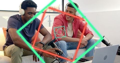 Friends streaming podcast with headphones and mic in casual living room with neon overlays