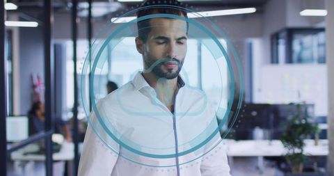 Professional using holographic cloud interface in modern open office for collaboration