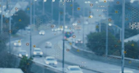 Futuristic Urban Traffic with Technology Overlays at Dusk