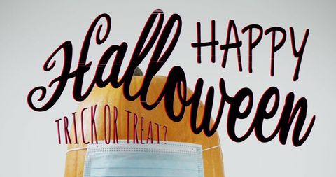 Halloween pumpkin wearing face mask celebrate safely