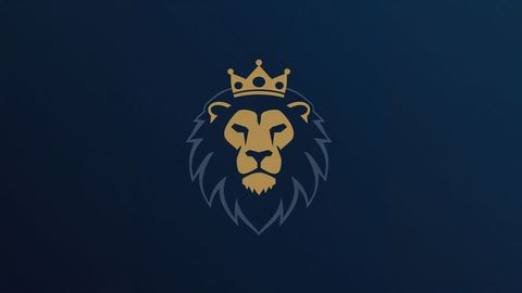 Regal british empire lion head with gold crown embellishment on dark blue