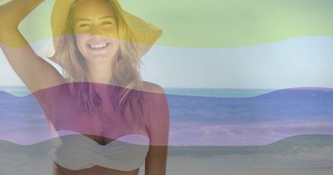 Joyful woman in straw hat enjoying summer beach day