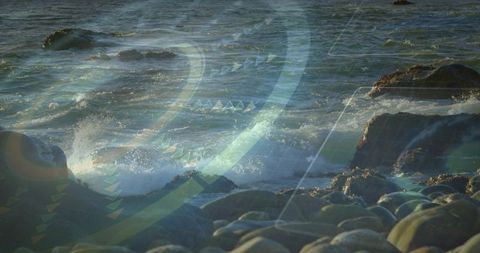 Crashing waves on rocky coast with futuristic hud overlay and translucent rings