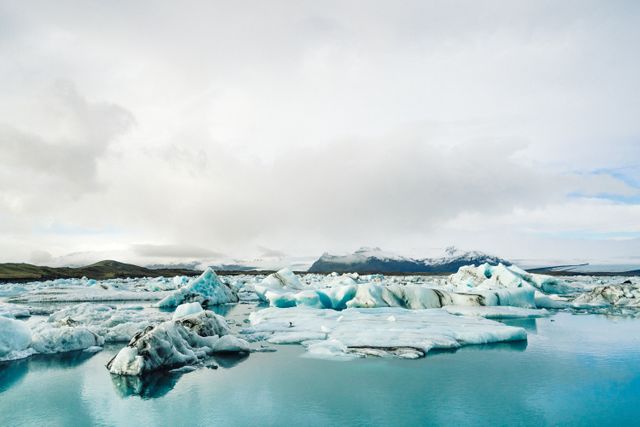 Majestic Glacial Landscape in Iceland with Icebergs Floating - Download Free Stock Photos Pikwizard.com