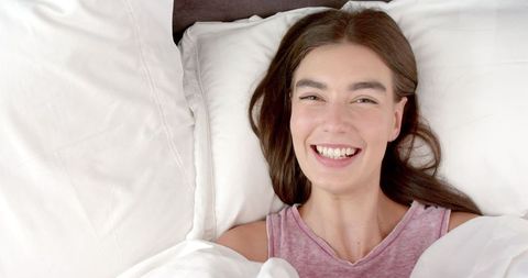 Smiling Teen Relaxing in Bed at Home, Happy Morning Vibes