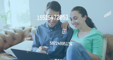Smiling Couple Engaging with Futuristic Digital Numbers