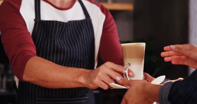 Person Receiving Latte From Barista at Coffee Shop - Download Free Stock Images Pikwizard.com