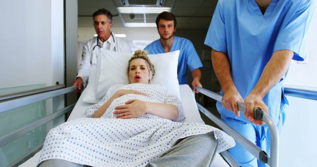 Pregnant Woman in Labor Being Transported in Hospital - Download Free Stock Images Pikwizard.com