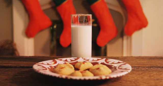 Gingerbread cookies with a glass of milk on wooden table during christmas time 4k - Download Free Stock Photos Pikwizard.com