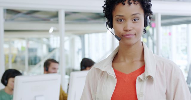 Confident Customer Support Representative Wearing Headset in Modern Office - Download Free Stock Images Pikwizard.com