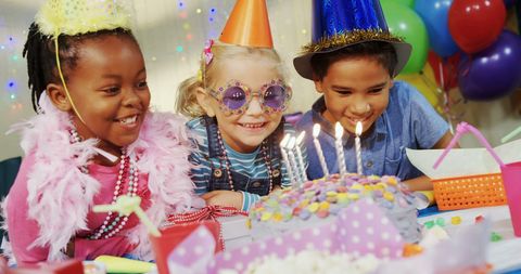 Diverse Children Celebrating Vibrant Birthday Party with Cake and Hats - Download Free Stock Images Pikwizard.com
