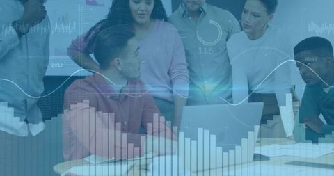 Diverse Team Collaborating with Data at Office Meeting