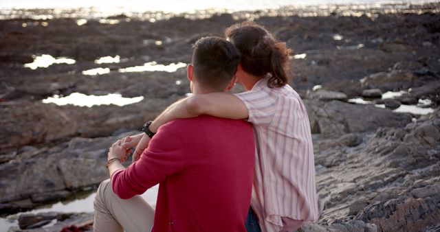 Couple Enjoying Scenic Ocean View on Rocky Shore - Download Free Stock Images Pikwizard.com