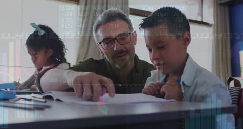 Teacher Assisting Students with Data Overlays in Classroom