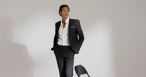 Elegant businessman posing in stylish suit