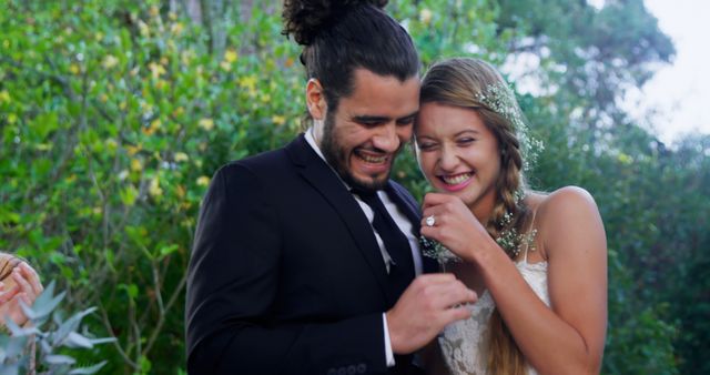 Bride and Groom Laughing Together Outdoors on Wedding Day - Download Free Stock Images Pikwizard.com