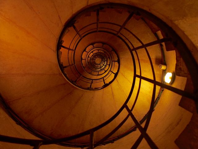 Spiral Staircase with Warm Lighting and Industrial Design - Download Free Stock Photos Pikwizard.com