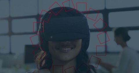 Woman engaging with virtual reality headset in office setting