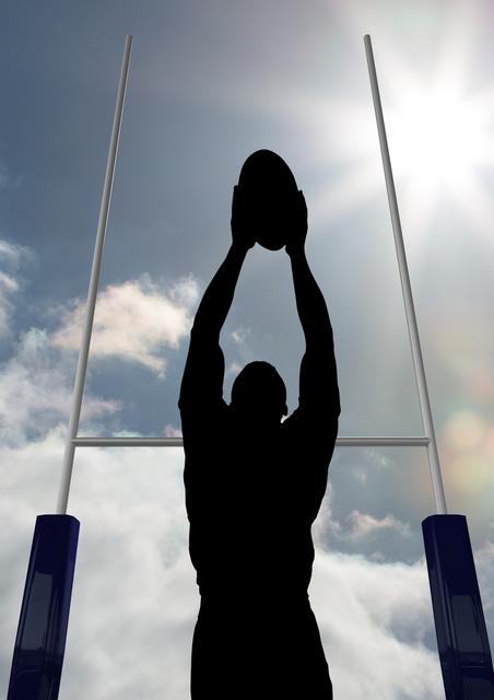 Silhouette of a rugby player jumping to catch the ball with sunlight and clouds in the background. Great for use in sports promotions, rugby event advertisements, athletic training materials, or inspirational sports posters.