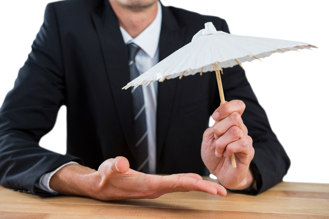 Businessman Holding Transparent Paper Umbrella for Creative Concept - Download Free Stock Videos Pikwizard.com