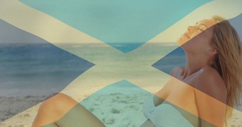 Relaxing woman in bikini on sandy shore with artistic overlay