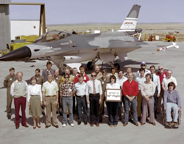 An early (1983) photograph of the AFTI F-16 team, commemorating the aircraft's 50th flight. It shows the initial configuration and paint finish of the AFTI F-16, as well as the forward mounted canards and the spin chute.